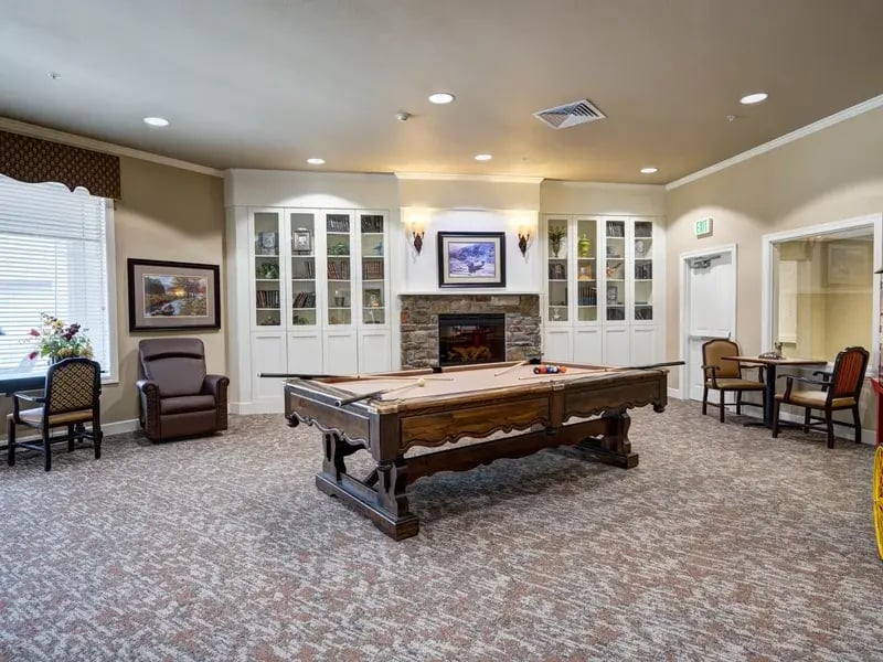 Well-equipped game room at Cedar Creek of Prairie Meadows, where residents can enjoy a friendly game of pool