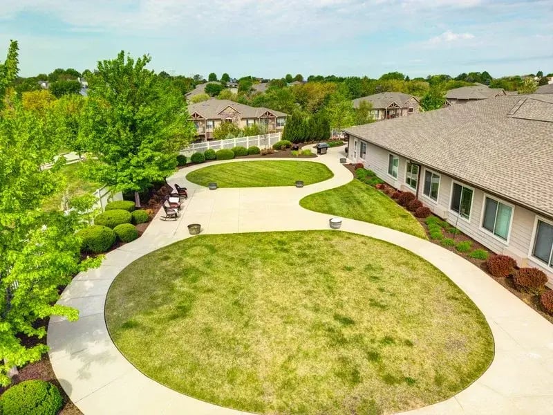 An aerial perspective showcasing the Cedar Creek of Prairie Meadows community, highlighting the inviting courtyards