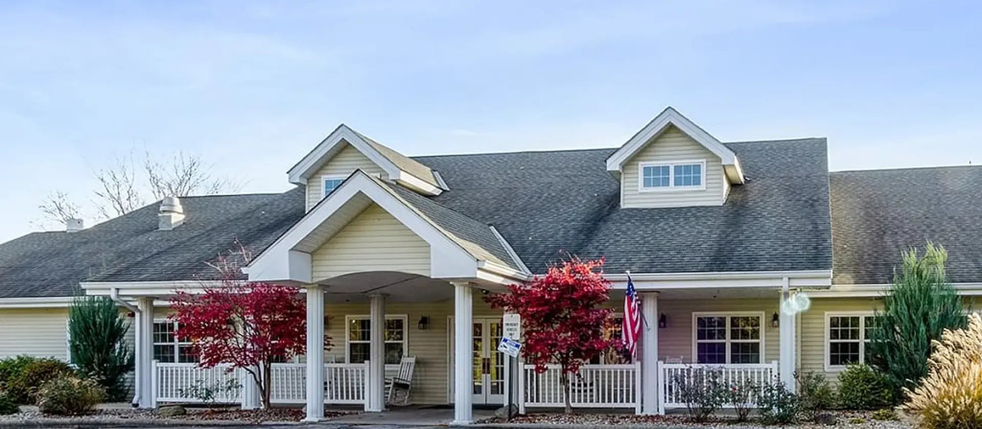The welcoming front exterior of Cedar Creek of Warsaw senior living community