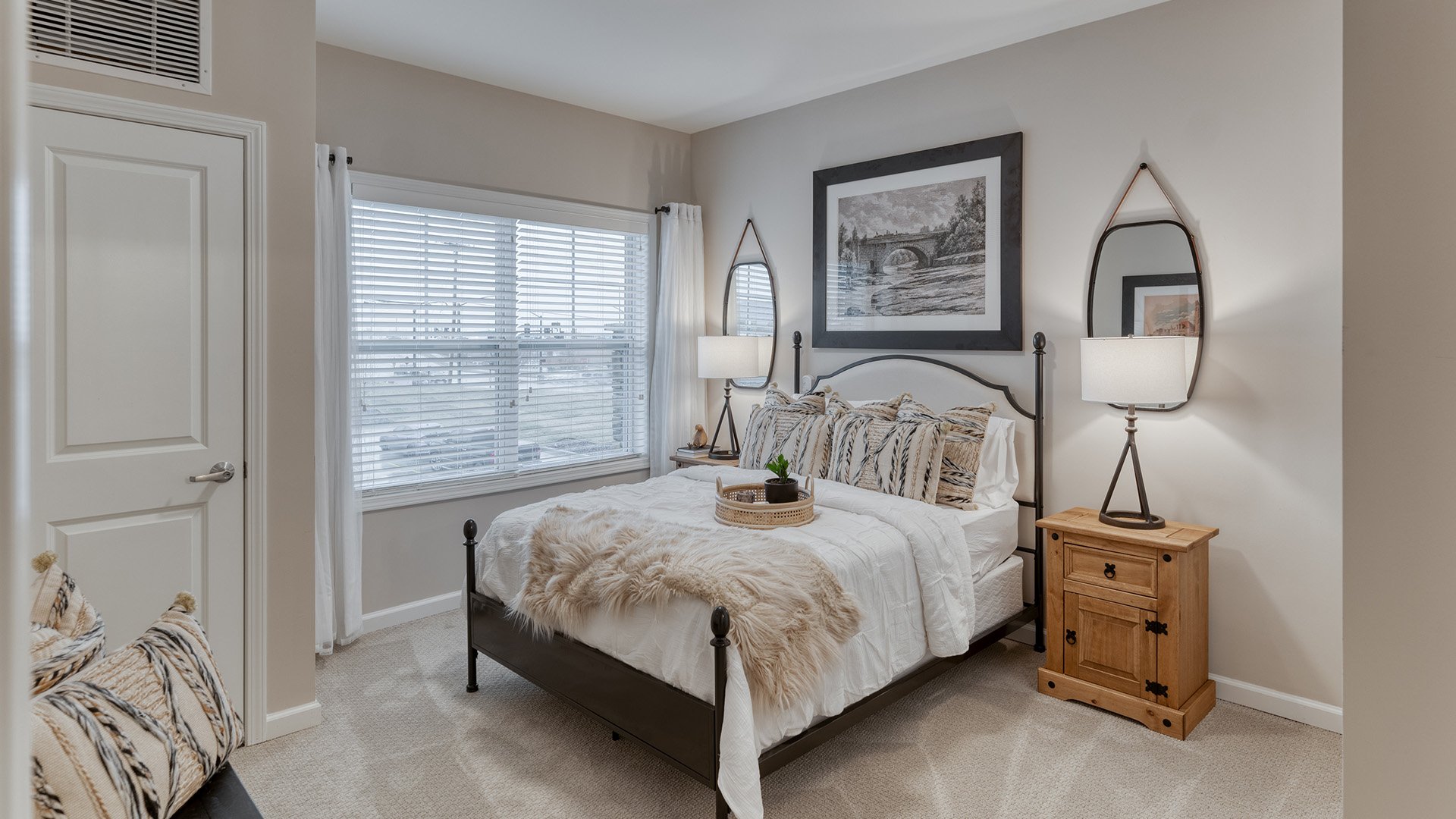 Bedroom of a senior apartment at Cedarhurst of Arnold, designed for comfort and personalization