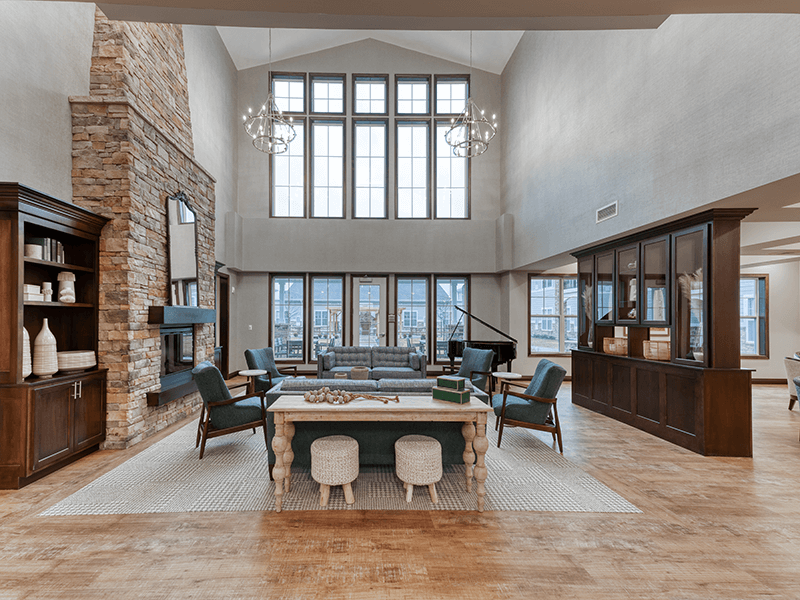 Cedarhurst of Arnold's welcoming common area, complete with comfortable furniture and a warm fireplace for relaxation and socialization