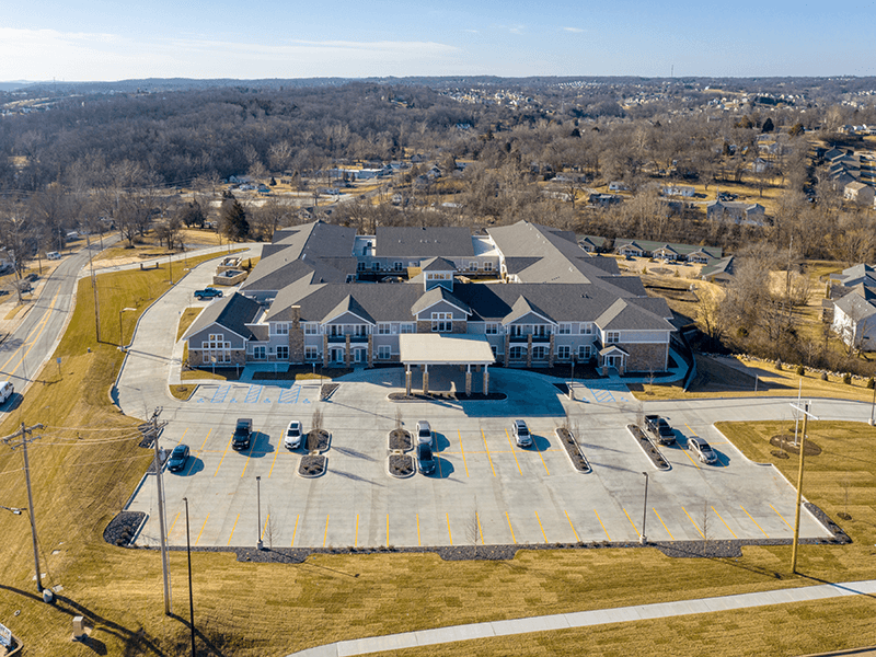 Aerial view of the entire Cedarhurst of Arnold senior living community building and grounds