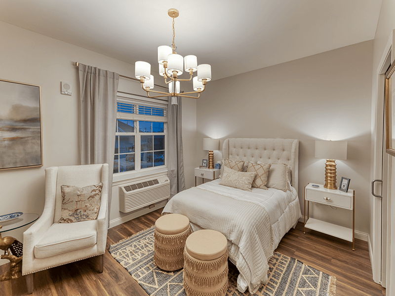 Bedroom of a senior apartment at Cedarhurst of Beaumont, designed for comfort and personalization