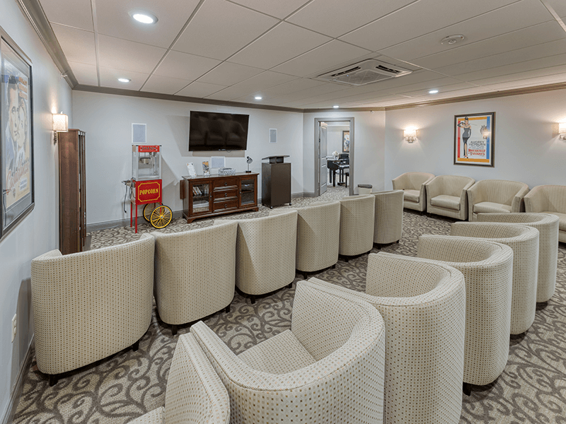 The comfortable and accessible movie theater at Cedarhurst of Beaumont, providing easy-to-access entertainment for residents.