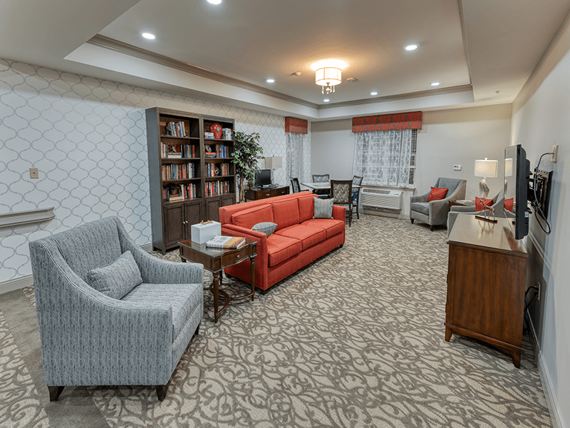 Cedarhurst of Beaumont's welcoming senior-friendly library with accessible resources for reading and relaxation