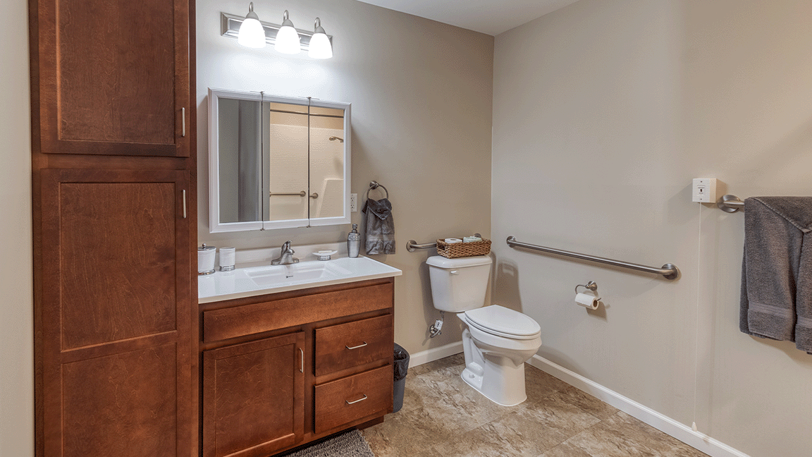 Bathroom of a senior apartment at Cedarhurst of Bethalto, built with accessibility features to support residents.