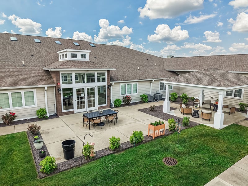 An inviting outdoor space at Cedarhurst of Bethalto, providing areas for relaxation and enjoyment