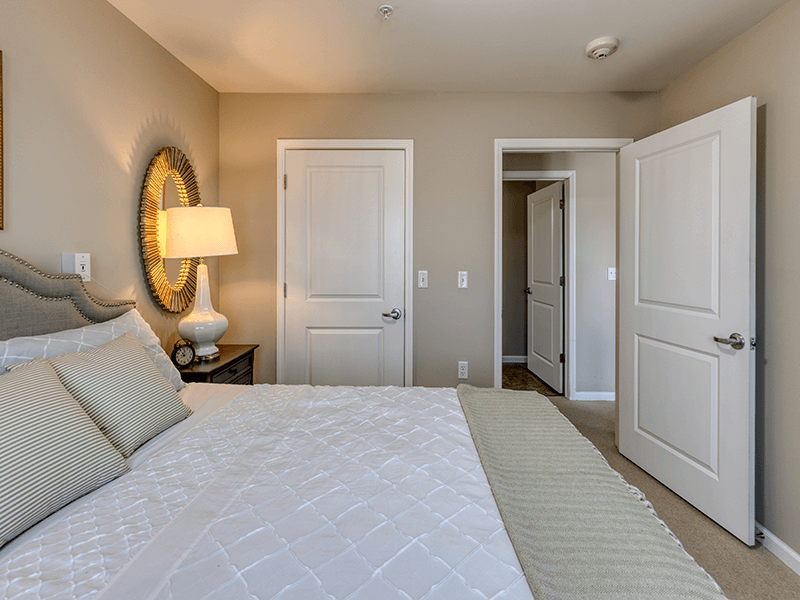 A cozy and well-appointed senior apartment bedroom for residents at Cedarhurst of Bethalto