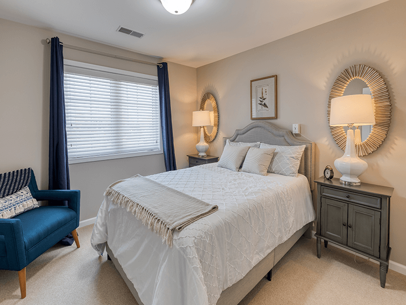 Bedroom of a senior apartment at Cedarhurst of Bethalto, designed for comfort and personalization