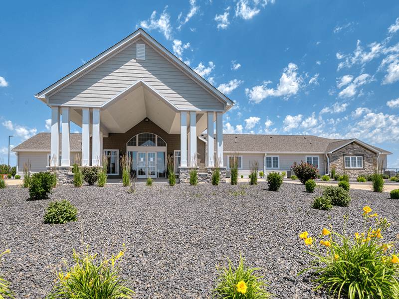 The welcoming front exterior of the Cedarhurst of Bethalto senior living community.