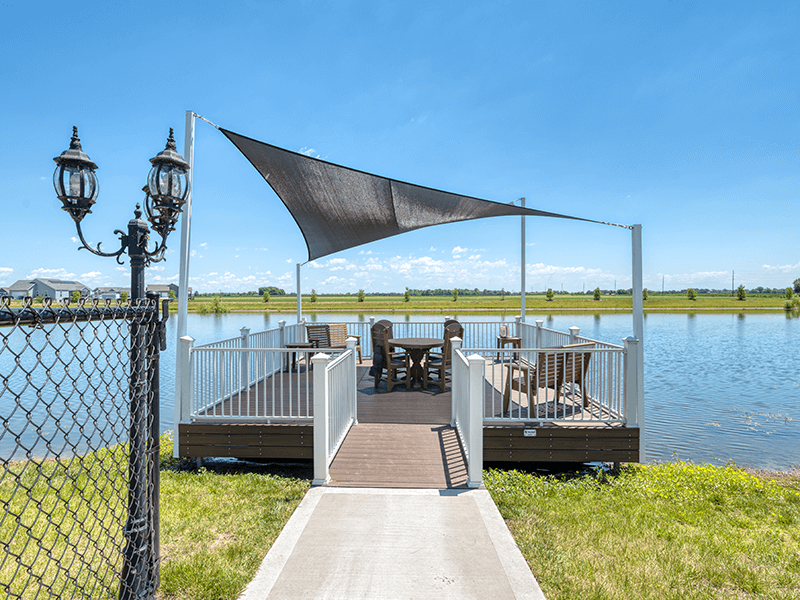 The picturesque outdoor dock at Cedarhurst of Bethalto, providing a peaceful spot for residents.