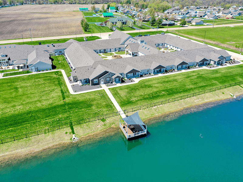 A picturesque view of the lake adjacent to the Cedarhurst of Bethalto senior living community