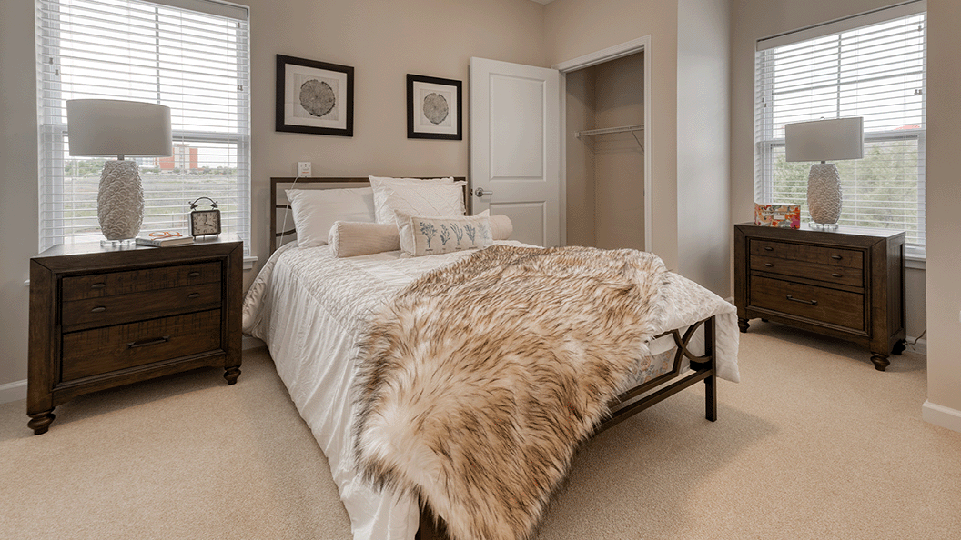Bedroom within a senior apartment at Cedarhurst of Blue Springs, designed for personal comfort.