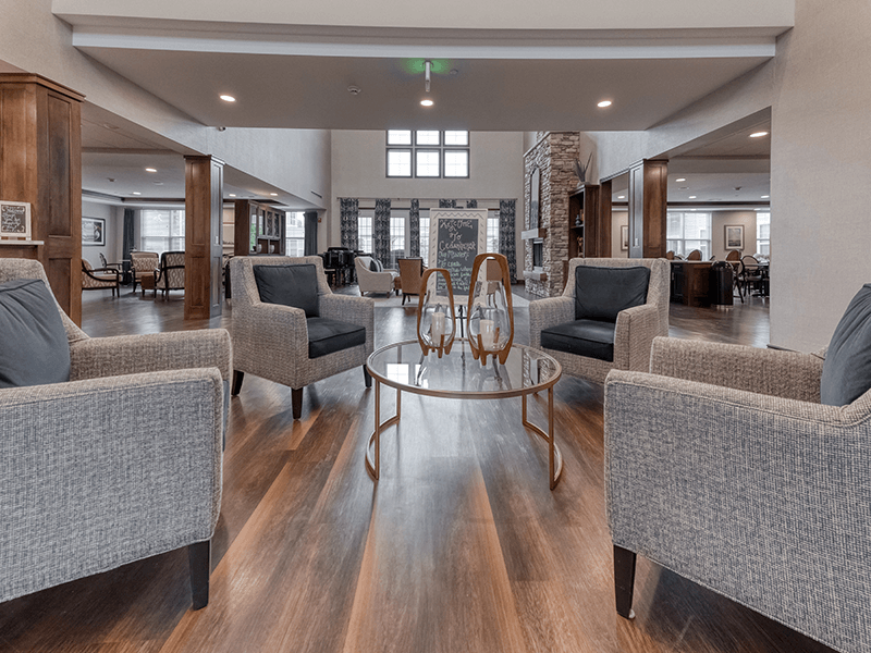 The bright and accessible main lobby at Cedarhurst of Blue Springs, offering a warm first impression to the senior living community.