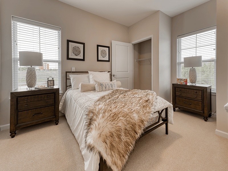Bedroom within a senior apartment at Cedarhurst of Blue Springs, designed for personal comfort.