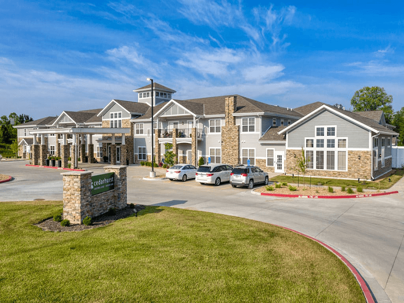 The welcoming front exterior of Cedarhurst of Blue Springs senior living community.