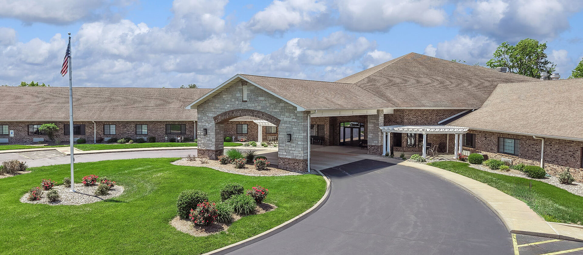 The welcoming front exterior of Cedarhurst of Breese senior living community
