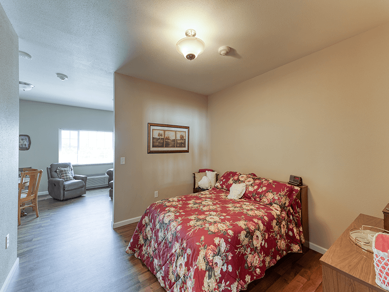 Bedroom of a senior apartment at Cedarhurst of Breese, designed for resident comfort and personalization.