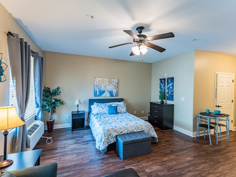 Bedroom of a senior apartment at Cedarhurst of Canton, designed for resident comfort and personalization
