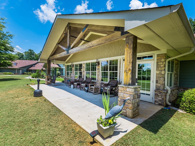 Versatile outdoor patio at Cedarhurst of Canton, featuring conversational seating and shaded areas
