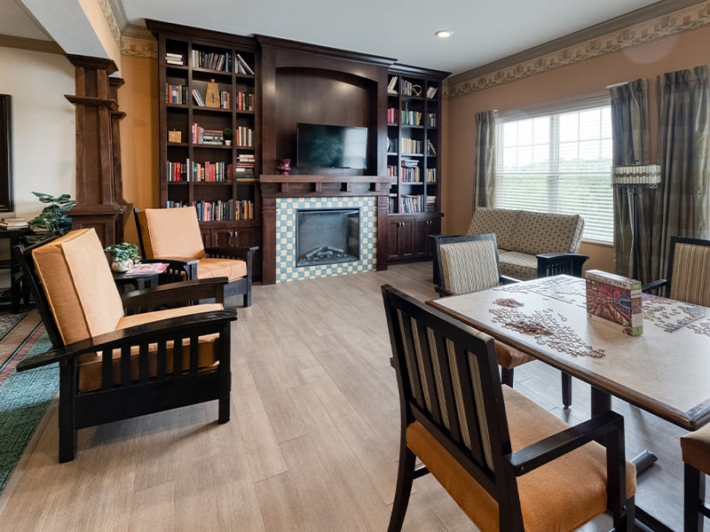 Common area at Cedarhurst of Columbia, which is ideal for residents to enjoy reading, unwinding, or playing games with friends