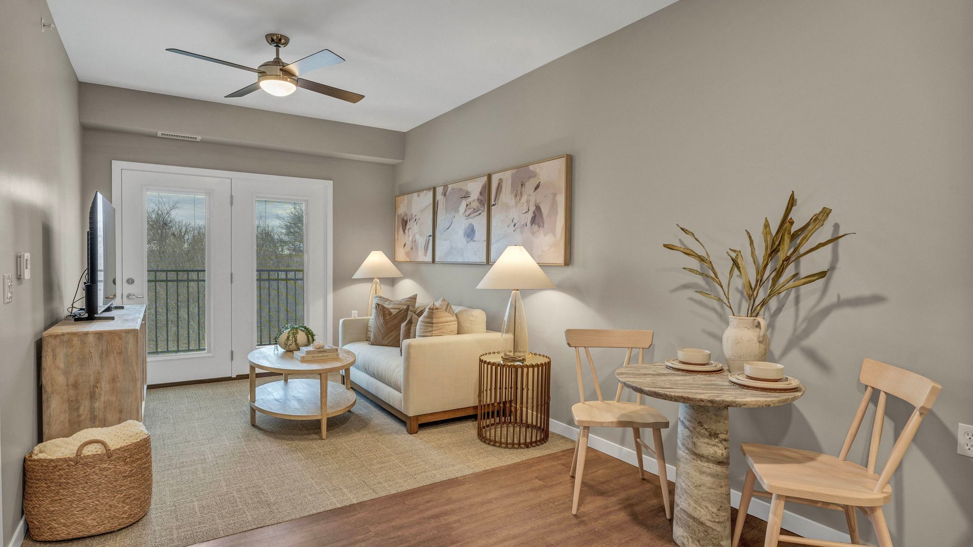 Senior-friendly apartment living room at Cedarhurst of Crown Point, offering comfortable and accessible design for residents