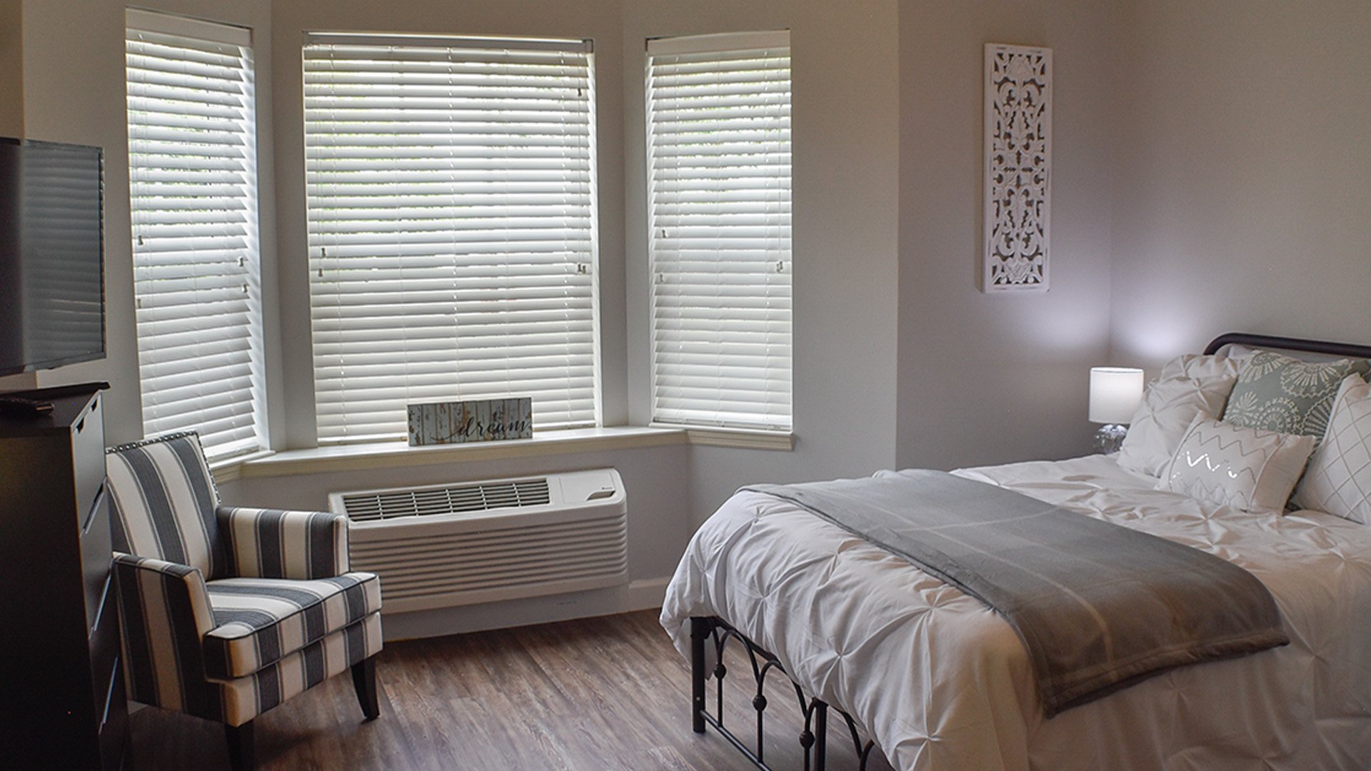 Bedroom of a senior apartment at Cedarhurst of Des Peres, designed for resident comfort and personalization