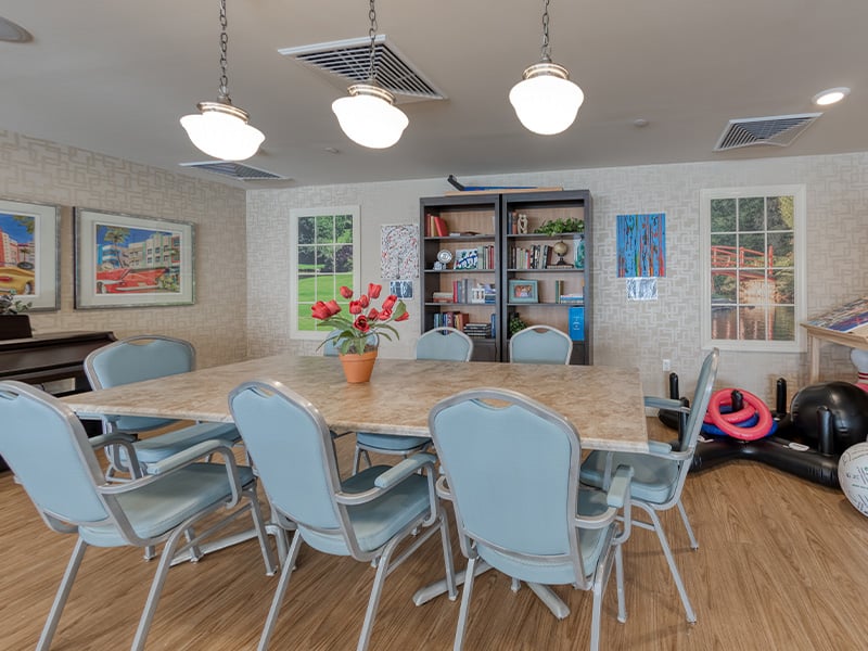 Residents at Cedarhurst of Des Peres enjoy a dedicated activity room, offering an accessible space for hobbies, crafts, and games