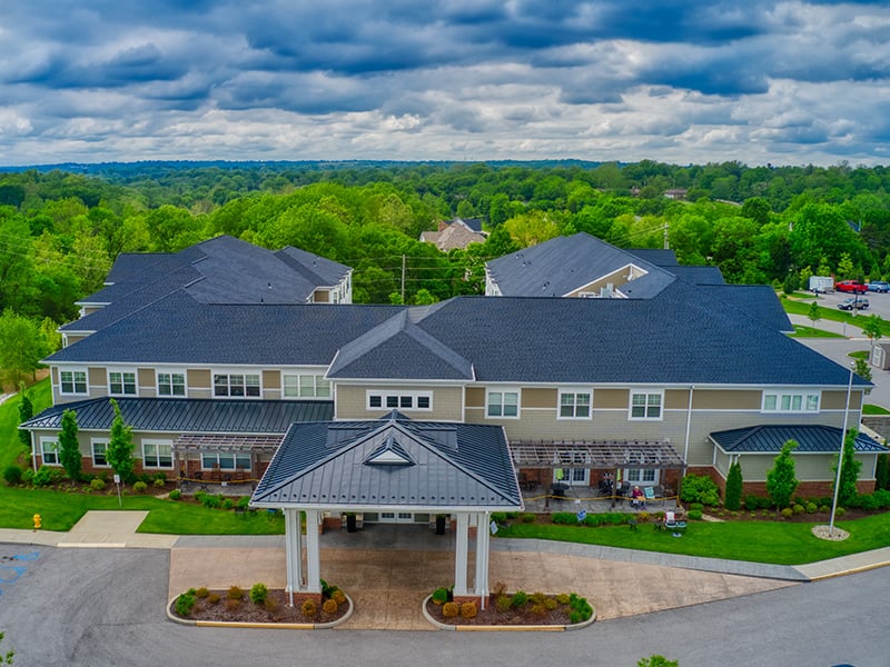 Aerial view of the entire Cedarhurst of Des Peres senior living community building and grounds
