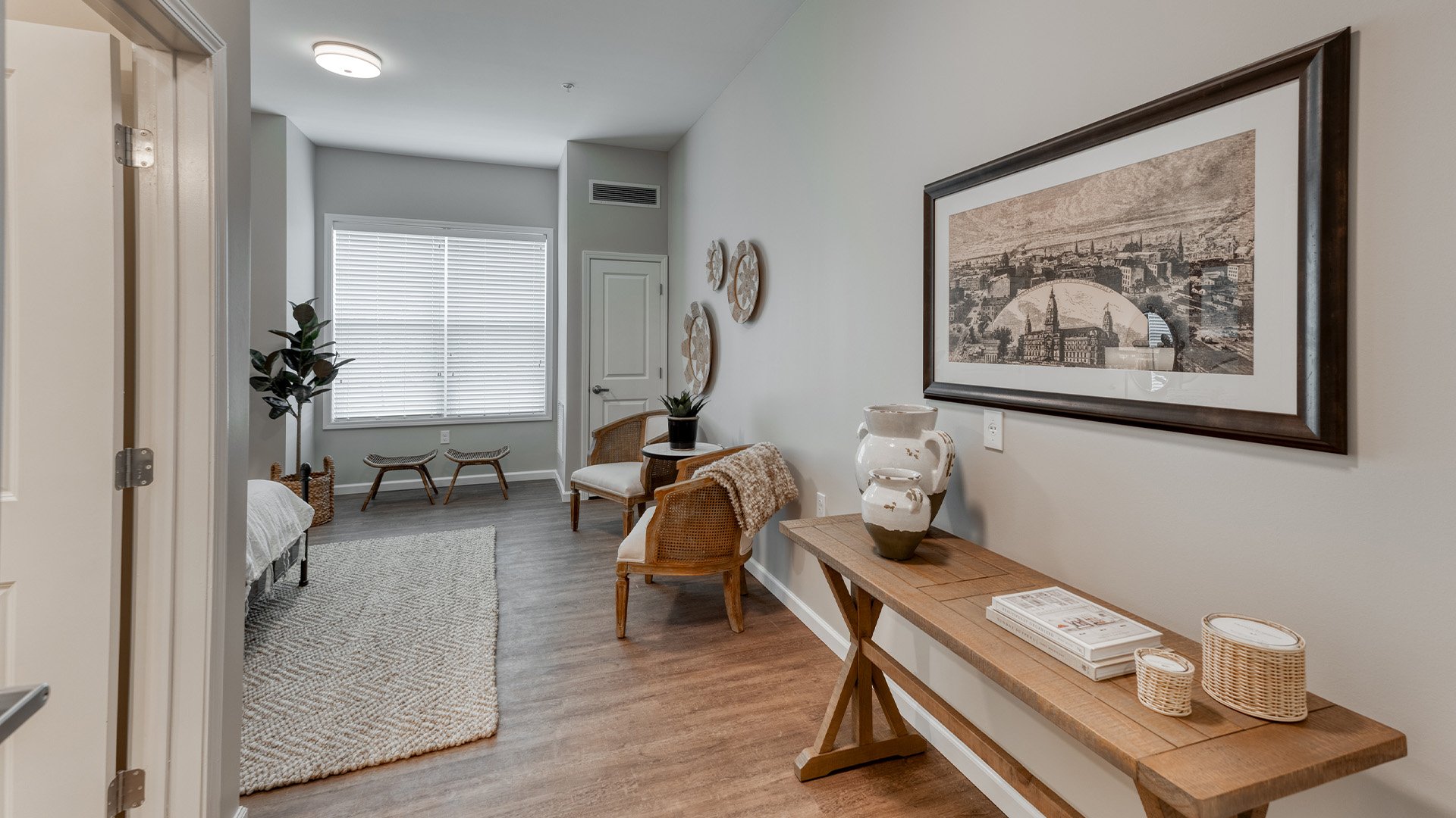 Senior-friendly apartment living room at Cedarhurst of Dyer, offering comfortable and accessible design for residents