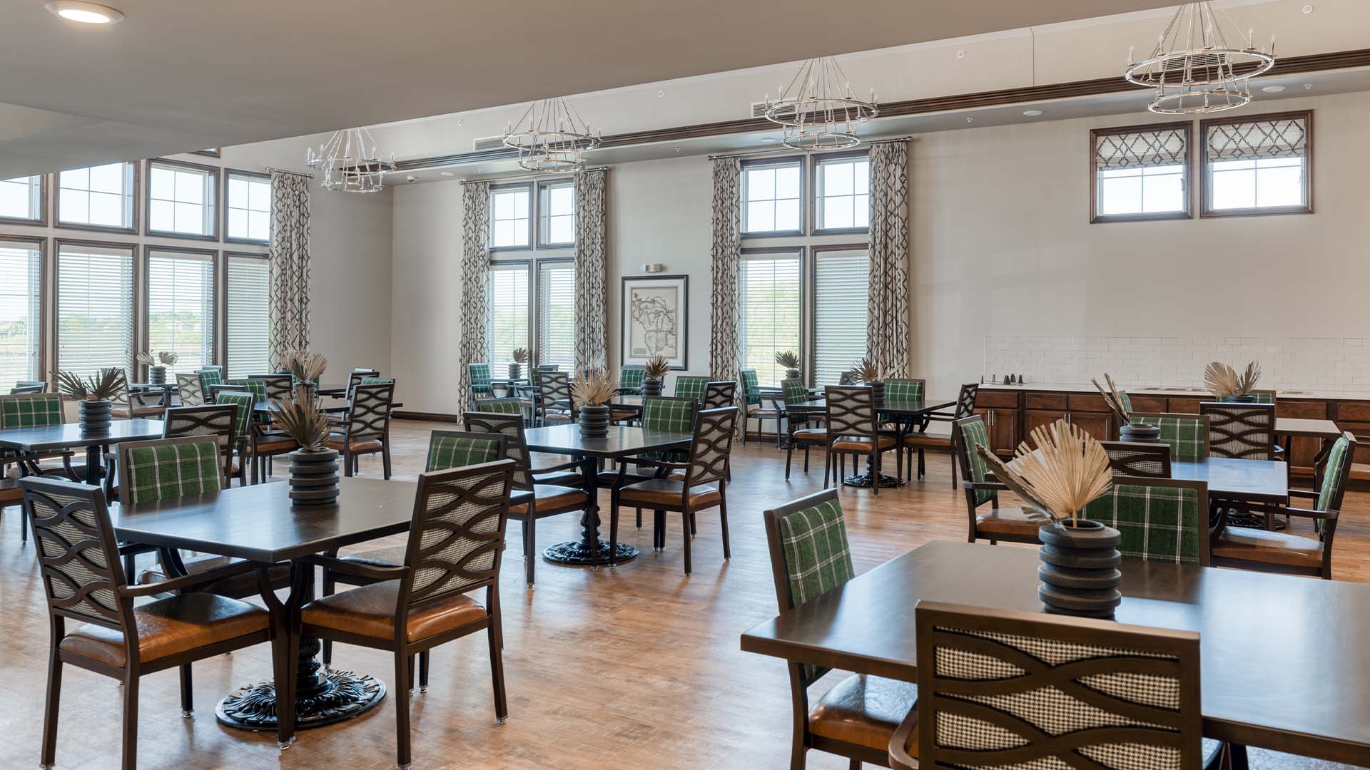 A spacious and bright dining room at Cedarhurst of Dyer, offering comfortable seating for meals