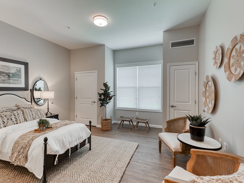 Bedroom of a senior apartment at Cedarhurst of Dyer, designed for resident comfort and personalization