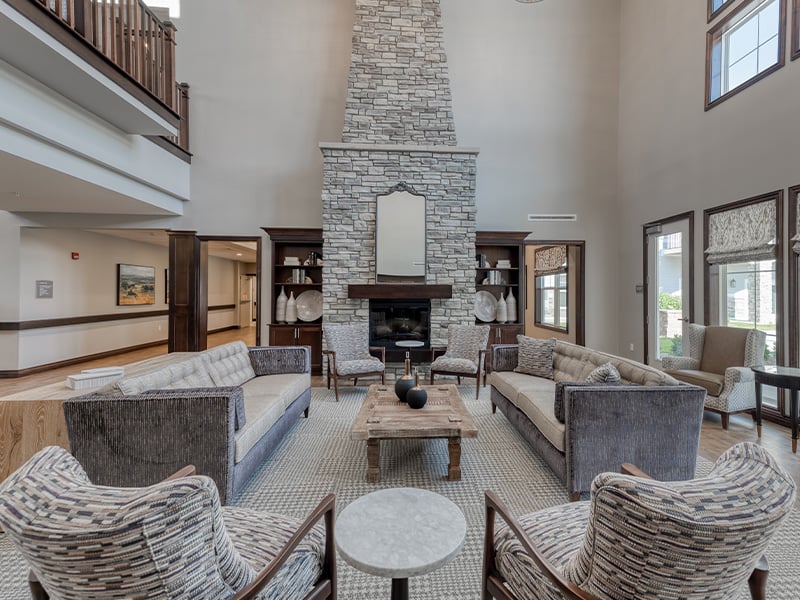 The bright and accessible main lobby at Cedarhurst of Dyer, offering a warm first impression to the senior living community