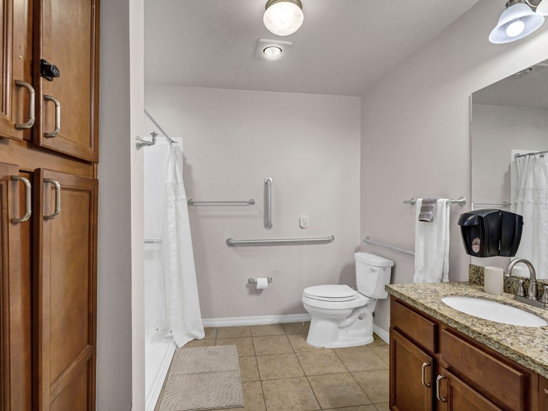 Bathroom of an apartment at Cedarhurst of East Louisville, built with accessibility features to support residents