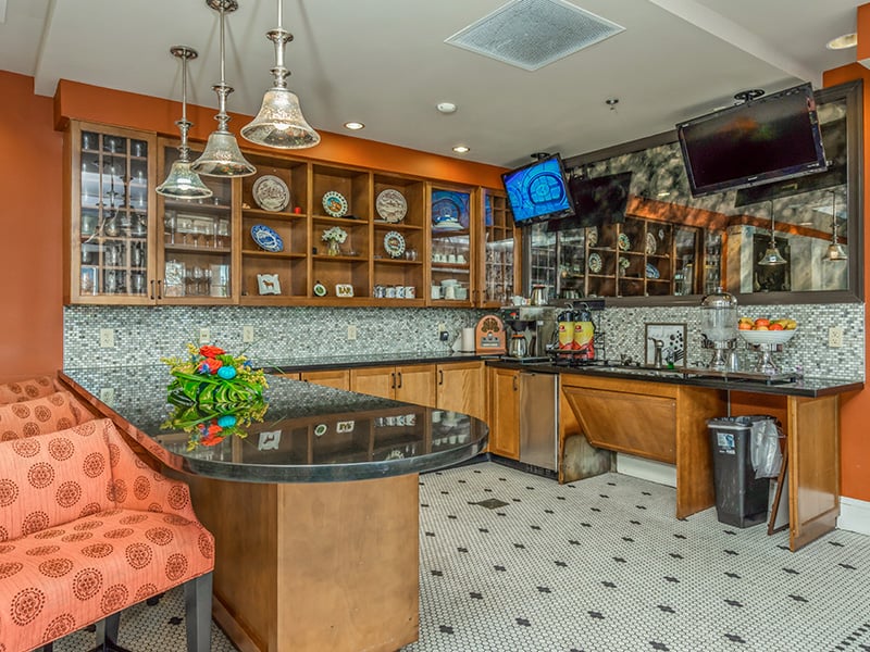 The inviting on-site bistro at Cedarhurst of East Louisville, offering a senior-friendly spot for coffee and socializing for residents