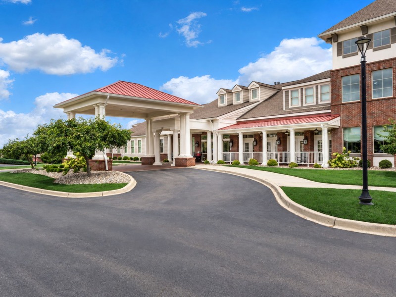 An inviting view of the Cedarhurst of East Louisville senior living community from the outside