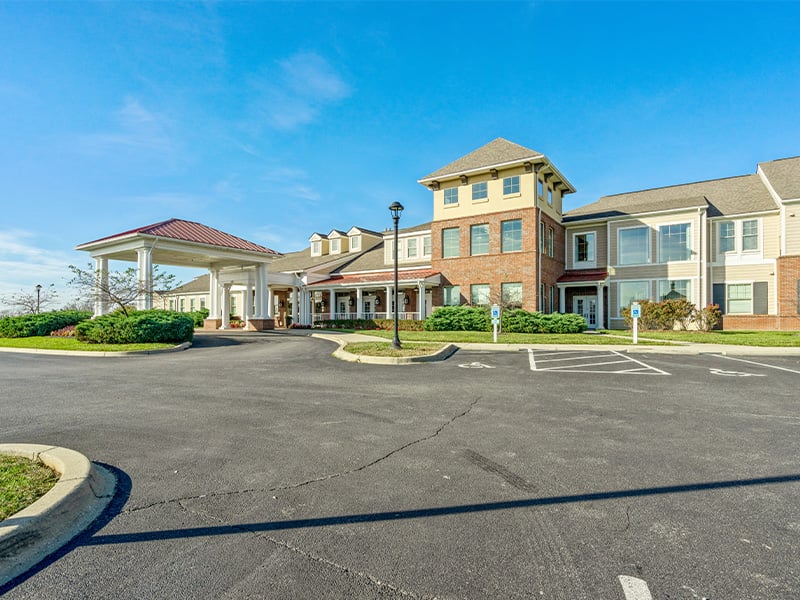 An inviting view of the Cedarhurst of East Louisville senior living community from the outside