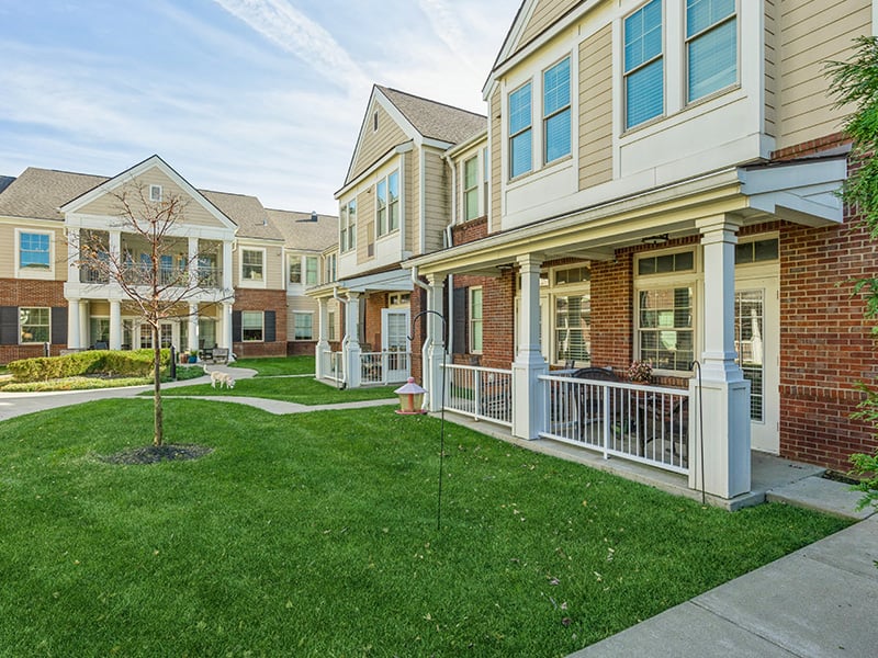 An inviting outdoor space at Cedarhurst of East Louisville, providing areas for relaxation and enjoyment