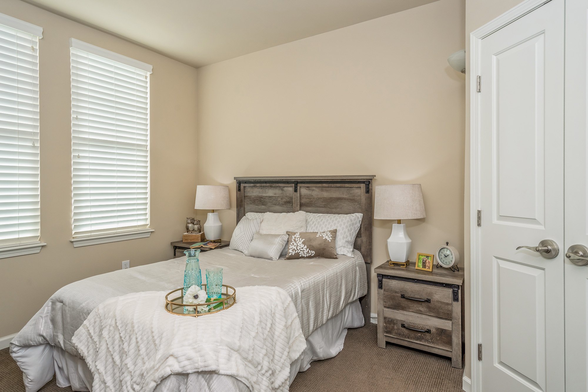 Bedroom of a senior apartment at Cedarhurst of East Louisville, designed for comfort and personalization