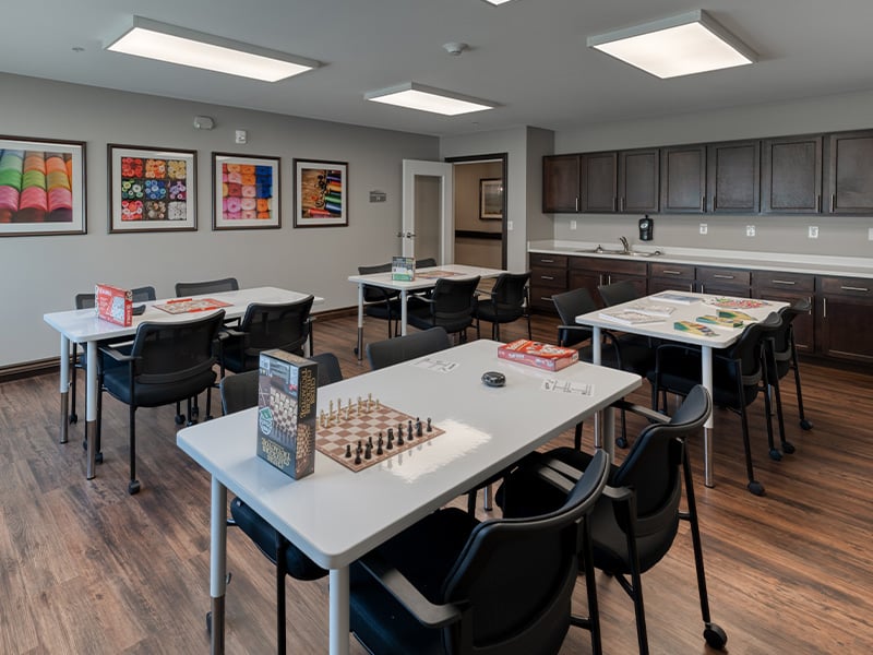 Dedicated art and activity room at Cedarhurst of Farmington, offering an accessible space for hobbies, crafts, and games
