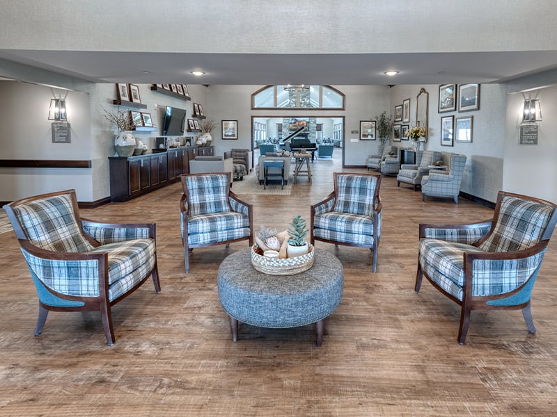 The bright and accessible main lobby at Cedarhurst of Farmington, offering a warm first impression to the senior living community