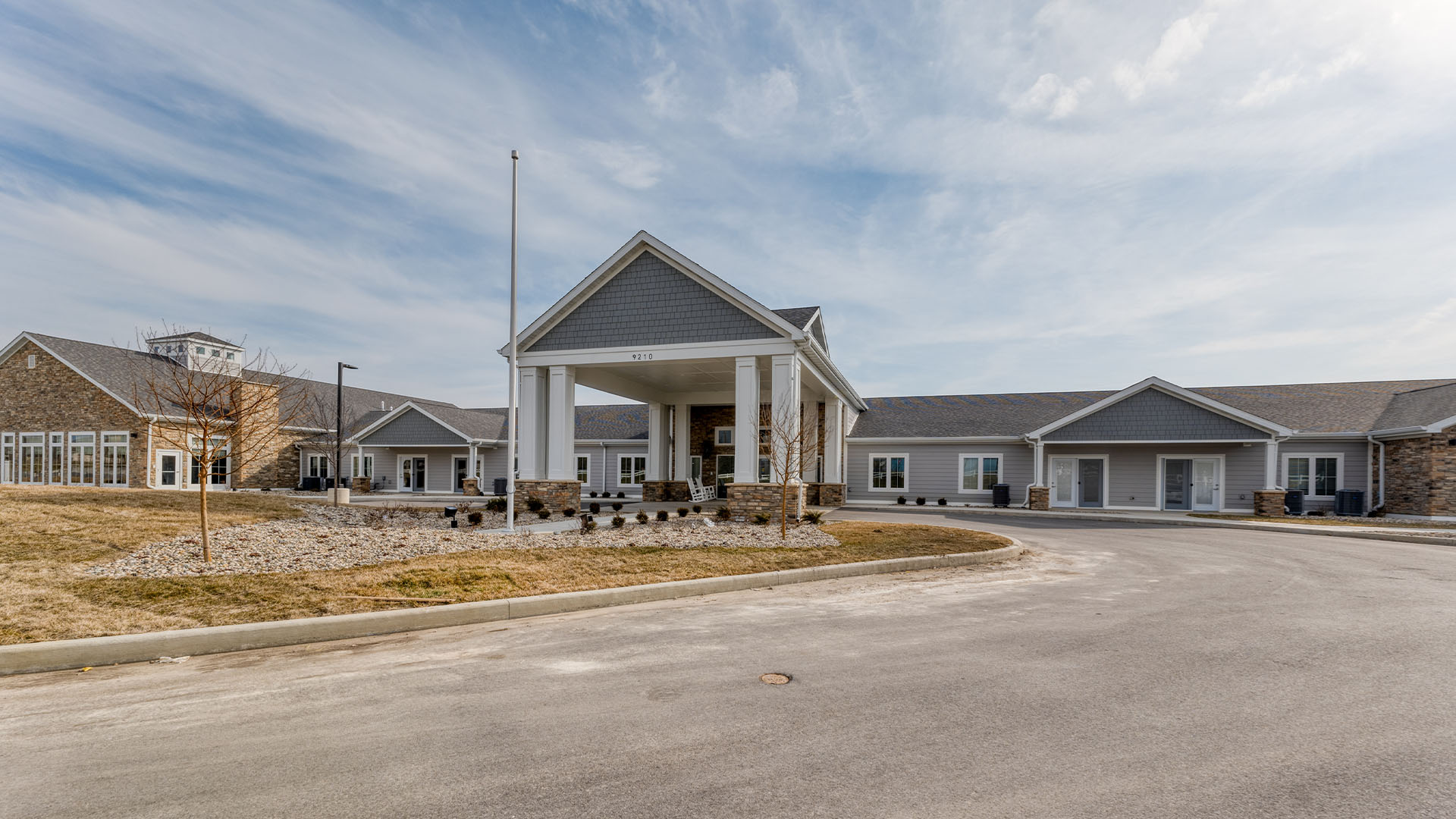 The welcoming front exterior of Cedarhurst of Fort Wayne senior living community