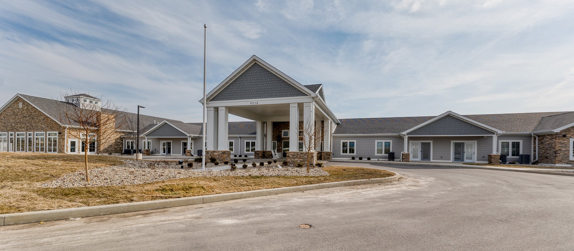 The welcoming front exterior of Cedarhurst of Fort Wayne senior living community