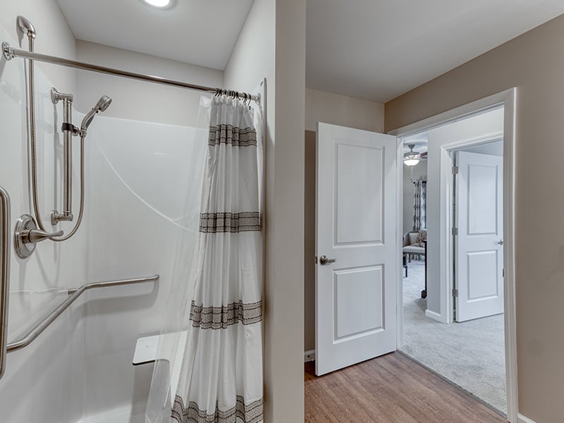 Bathroom of a senior apartment at Cedarhurst of Fort Wayne, built with accessibility features to support residents.