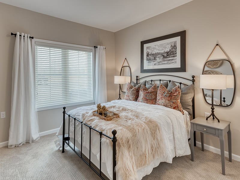 Bedroom of a senior apartment at Cedarhurst of Fort Wayne, designed for resident comfort and personalization.