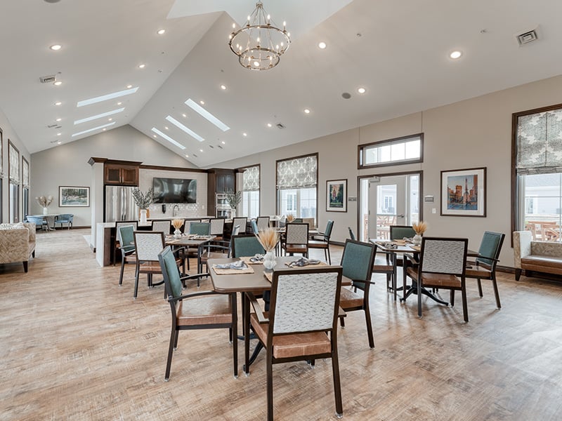 Another elegant dining space at Cedarhurst of Fort Wayne, offering comfortable, accessible seating for resident meals