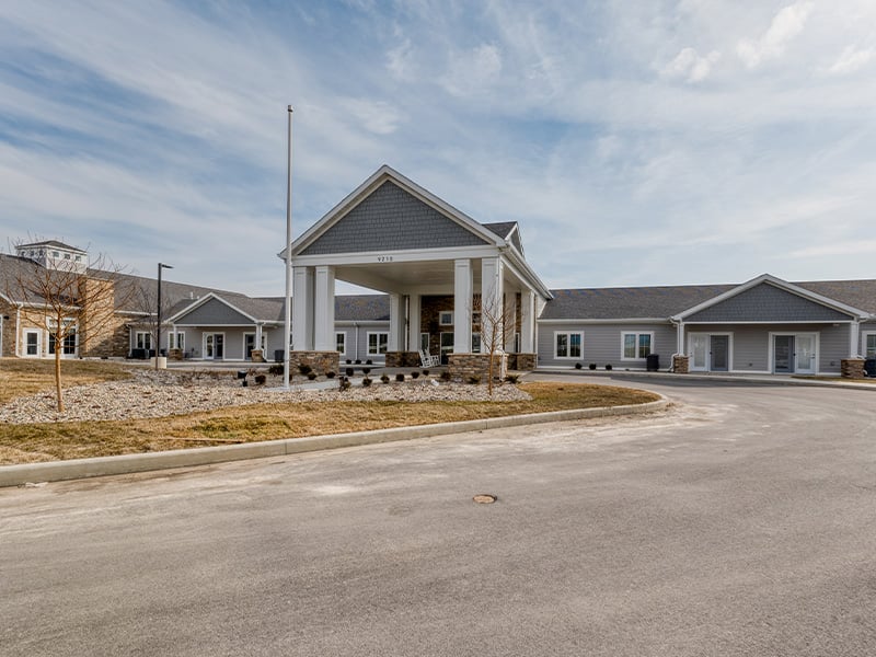 The welcoming front exterior of Cedarhurst of Fort Wayne senior living community