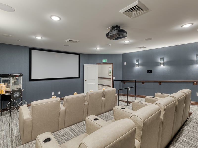 The comfortable and accessible movie theater at Cedarhurst of Fort Wayne, providing easy-to-access entertainment for residents