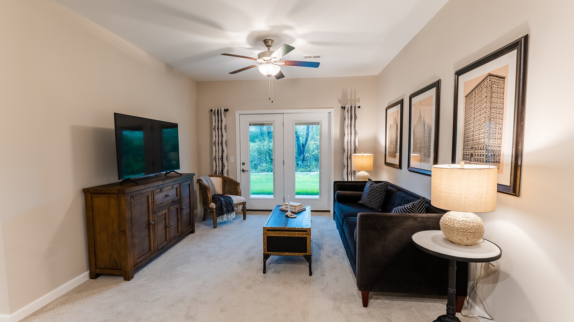 Senior-friendly apartment living room at Cedarhurst of Frankfort, offering comfortable and accessible design for residents.