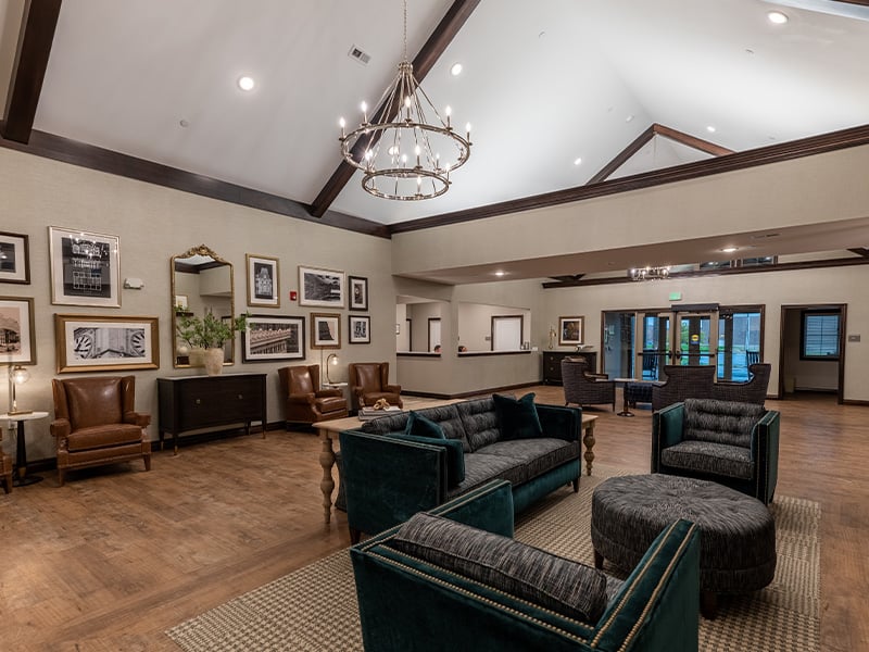 A spacious and inviting common area at Cedarhurst of Frankfort, designed for connection with comfortable seating for residents across all living options
